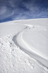 Snowmobile trail in snow