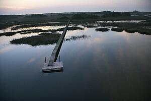 Boat dock and walkway over marsh at Bald Head Island North Carolina