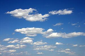 Cumulus clouds in blue sky
