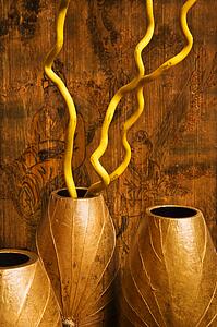 Interior vases with Asian scene in background.