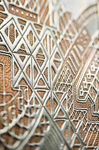 Selective focus shot of ornamental wall.