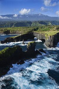 Aerial of rocky coast on Pacific ocean in Maui, Hawaii