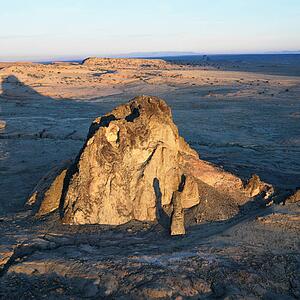 Aerial of scenic Arizona desert landscape with rock formation