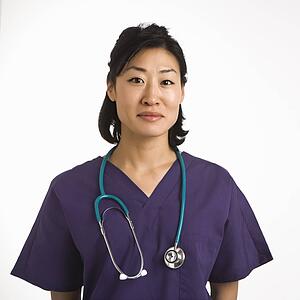 Asian woman doctor head and shoulder portrait against white background.