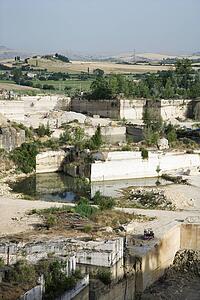 Open mine travertine stone quarry.
