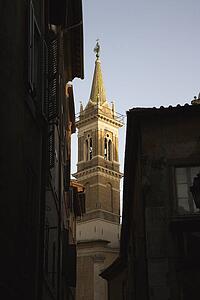 Church steeple and buildings in Rome, Italy.