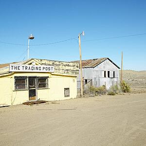 Old trading post in desert landscape of Utah.