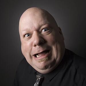 Bald man making a crazy face
