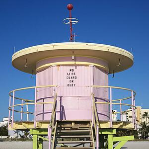 Pink art deco lifeguard tower closed up on beach in Miami, Florida, USA