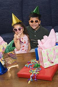Brother and sister wearing sunglasses 