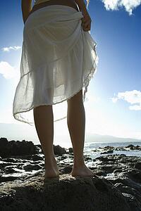 Rear view of woman in skirt outdoors