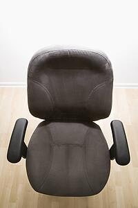 High angle view of empty office desk chair