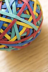 Still life of colorful rubber band ball.
