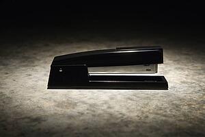Black stapler with black vignette