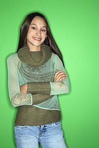 Girl with arms crossed standing