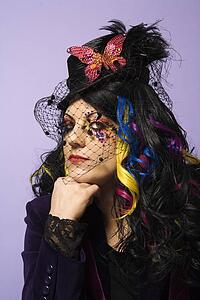 Woman in unique makeup and clothing 