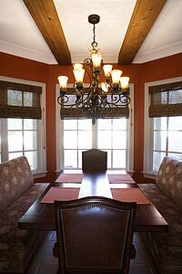 Dining room with table and chairs in affluent home