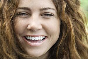 Female smiling and looking
