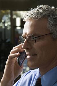 Profile shot of man on phone