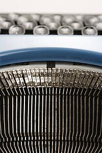 Close up of typewriter typebars.
