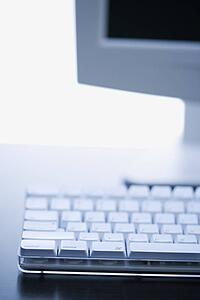 Still life of computer monitor and keyboard