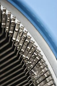 Close up of typewriter typebars.