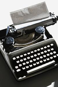 Above view of typewriter with paper.