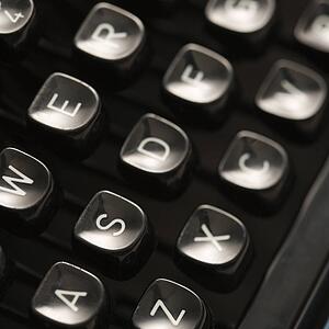 Close up of type levers on typewriter keyboard