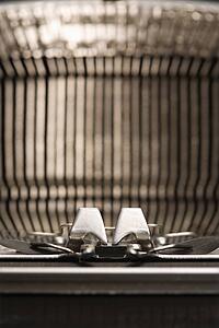 Close up of typewriter typebars.