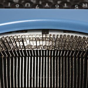 Close up of typewriter typebars.