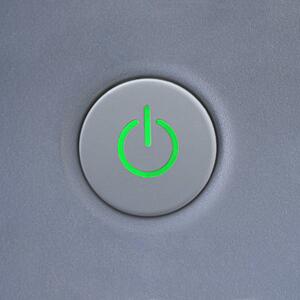 Close up of power symbol on power button on computer