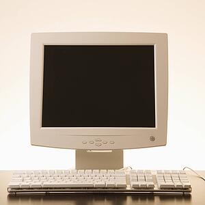 Still life of computer monitor and keyboard