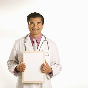 Doctor holding blank sign