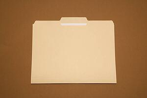 Blank folder on brown background