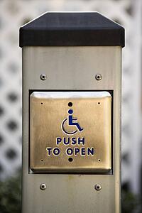 Entrance button for physically challenged people