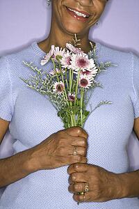 Female holding flowers