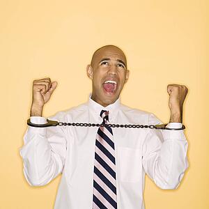 Man wearing handcuffs and screaming