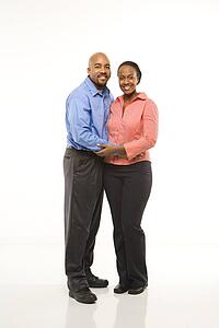 Couple with arms around each other