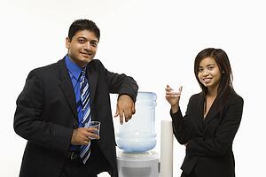 Standing at water cooler 