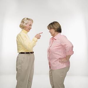 Women face to face arguing