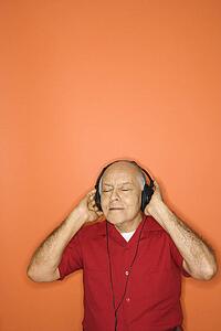Male listening to headphones