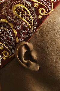 Man wearing traditional African hat