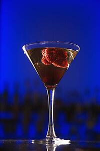 Martini cocktail with raspberry fruit 