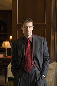 Businessman with hands in pockets
