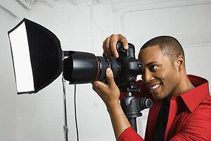 looking through camera on tripod