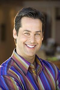 Mid adult man smiling at viewer