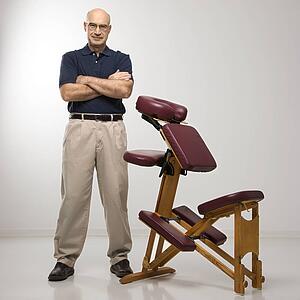 Massage therapist with massage chair