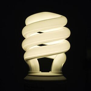 Studio shot of illuminated energy saving light bulb
