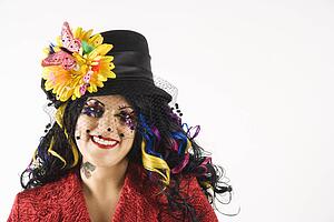 Woman in unique makeup and clothing 