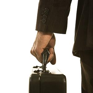 businessman holding briefcase